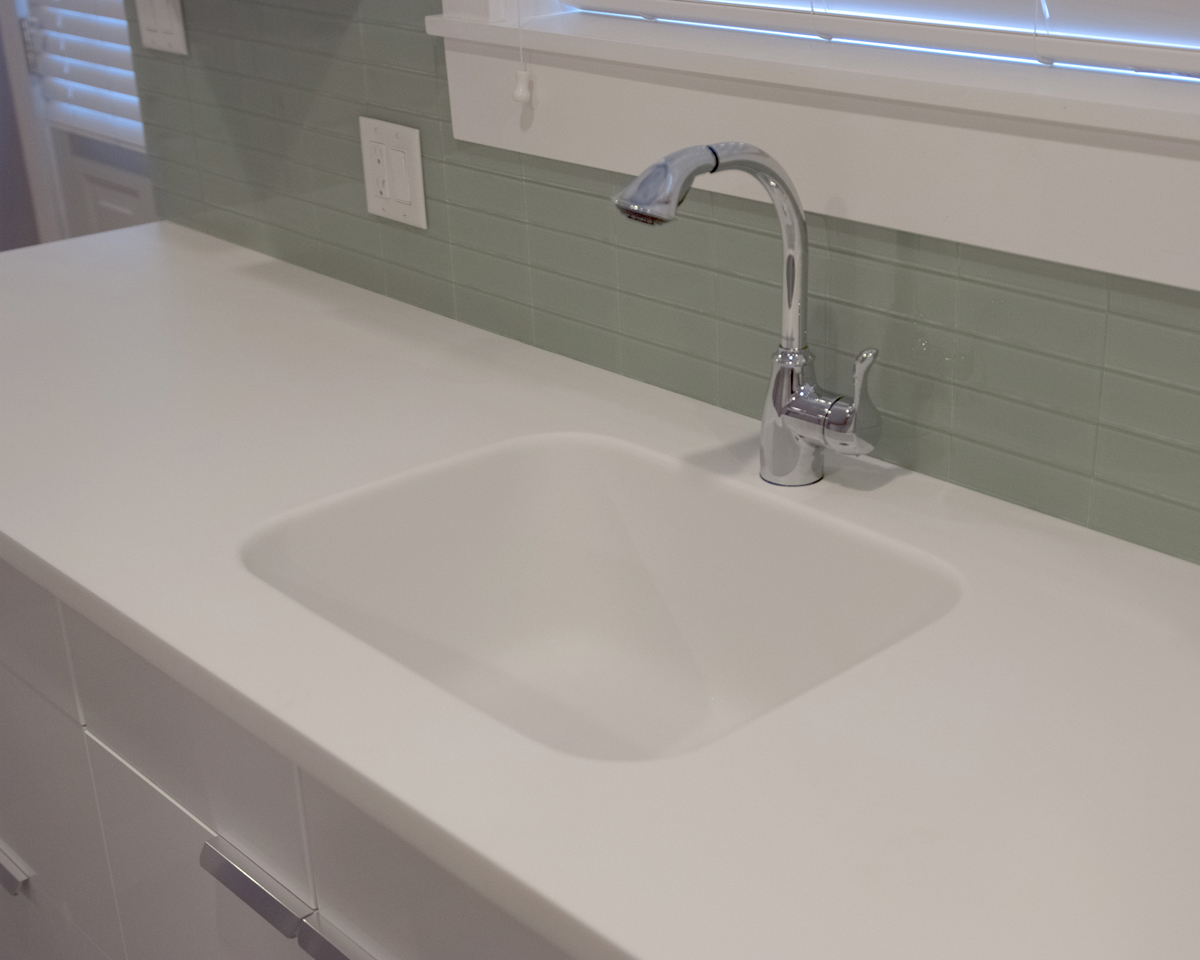 white bathroom integral sink and top